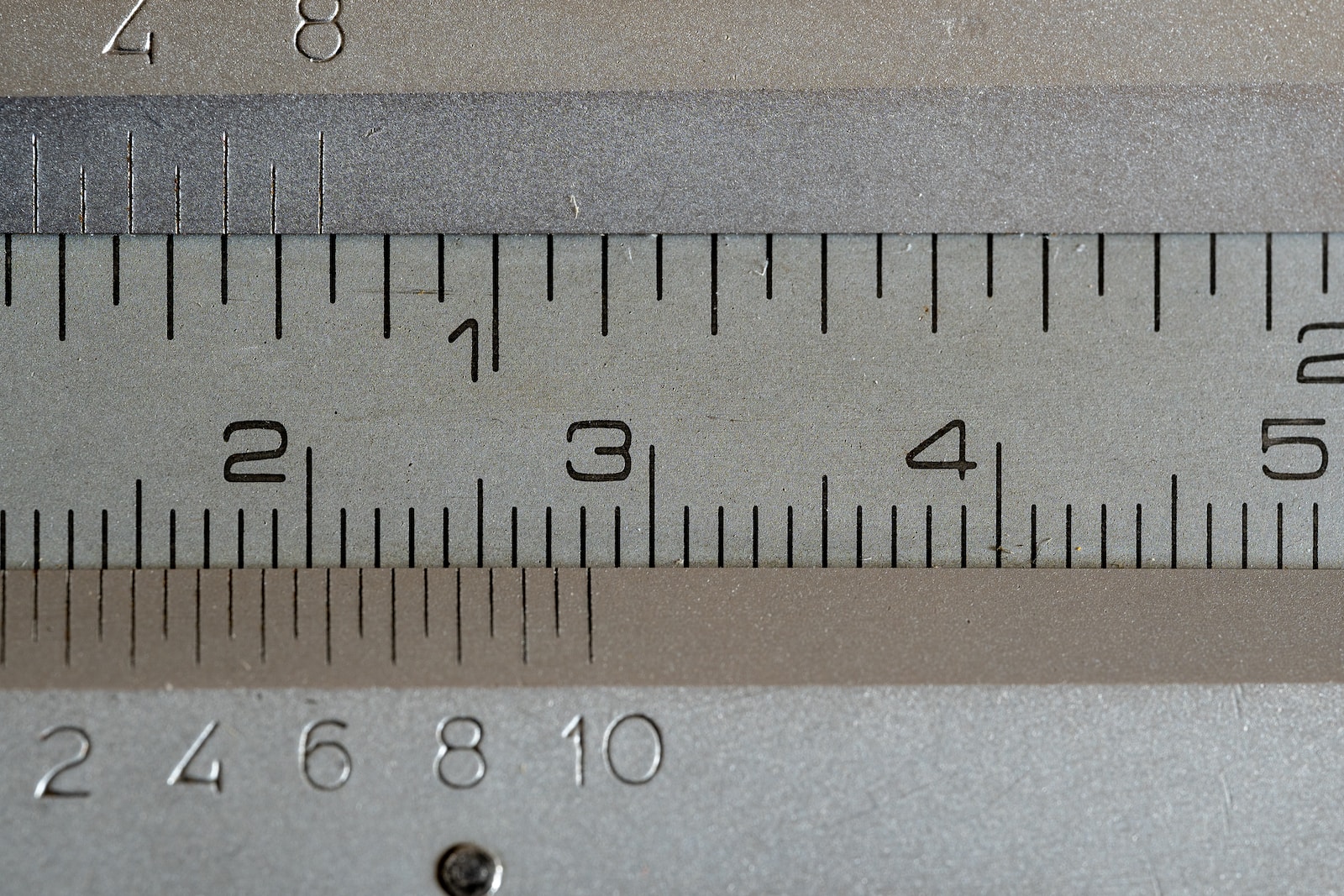 a close up of a measuring tape with numbers on it